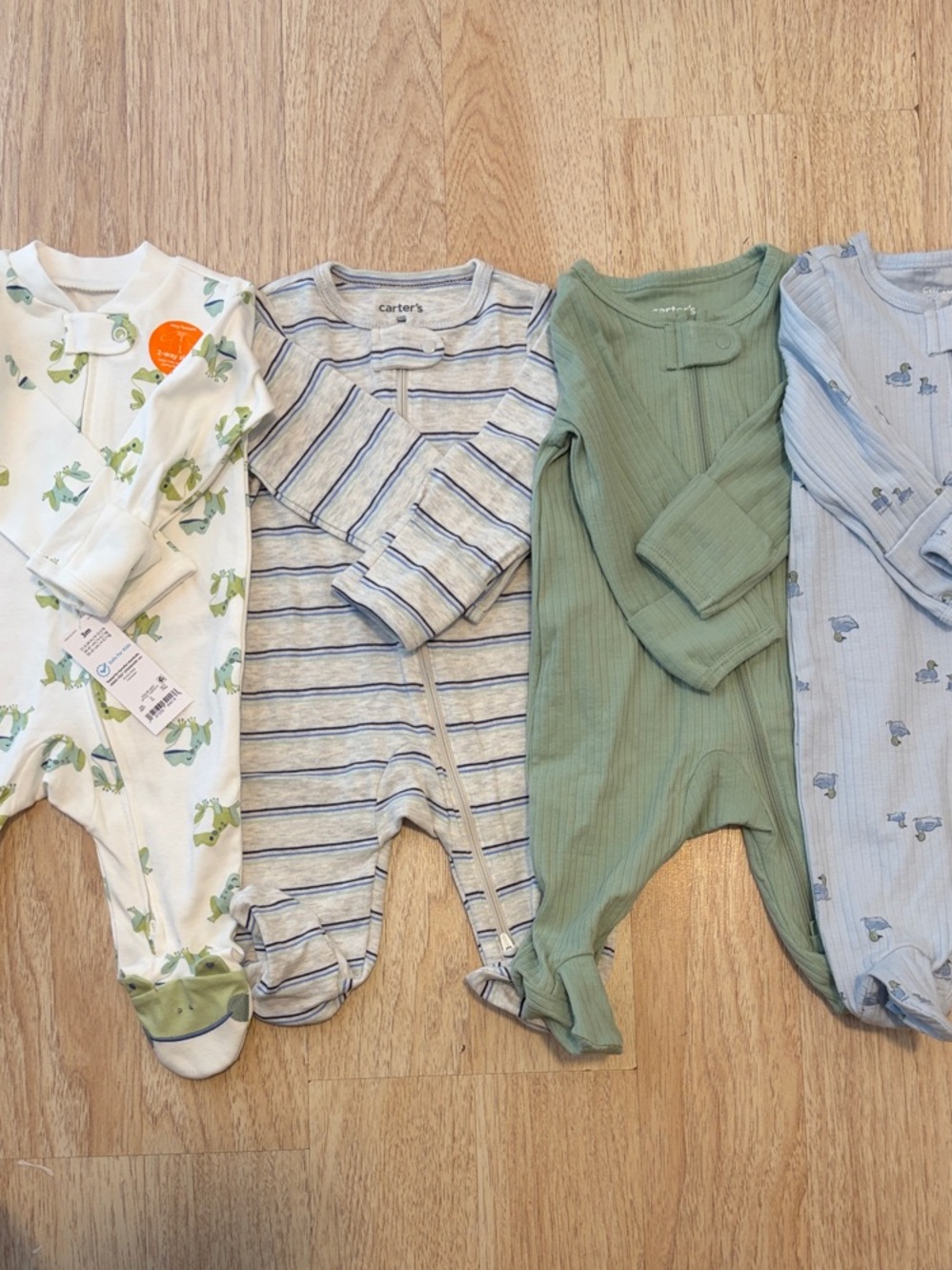 4 Carter's Ribbed Footed One-Pieces